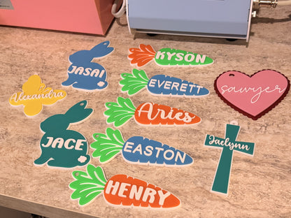 Actual 3D printed bunny carrot butterfly and cross name tags