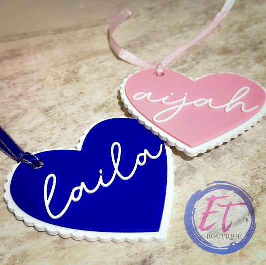 Two-color pink and blue heart basket tags with white backing and names